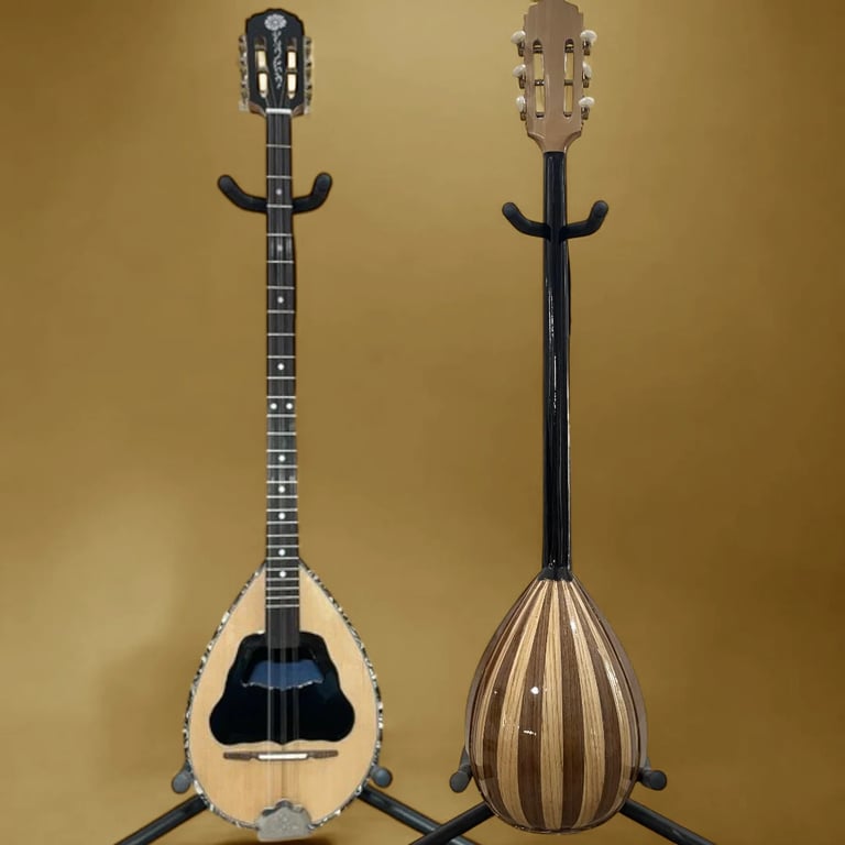 Front and back view of two oud instruments on stands against a gold background
