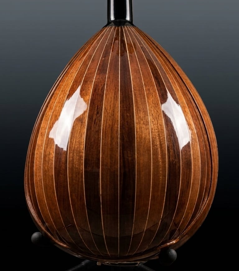 Teardrop-shaped decorative lamp with vertical ribbed copper-toned glass panels and metallic cap