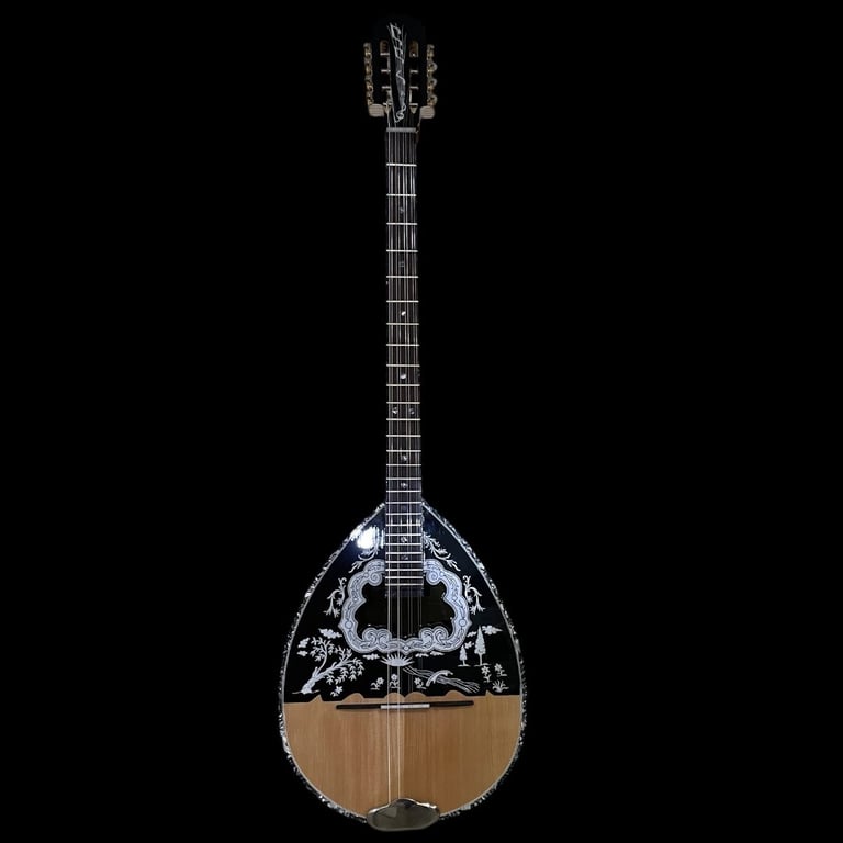 Greek bouzouki acoustic stringed instrument with ornate black pickguard and natural wood body against black background